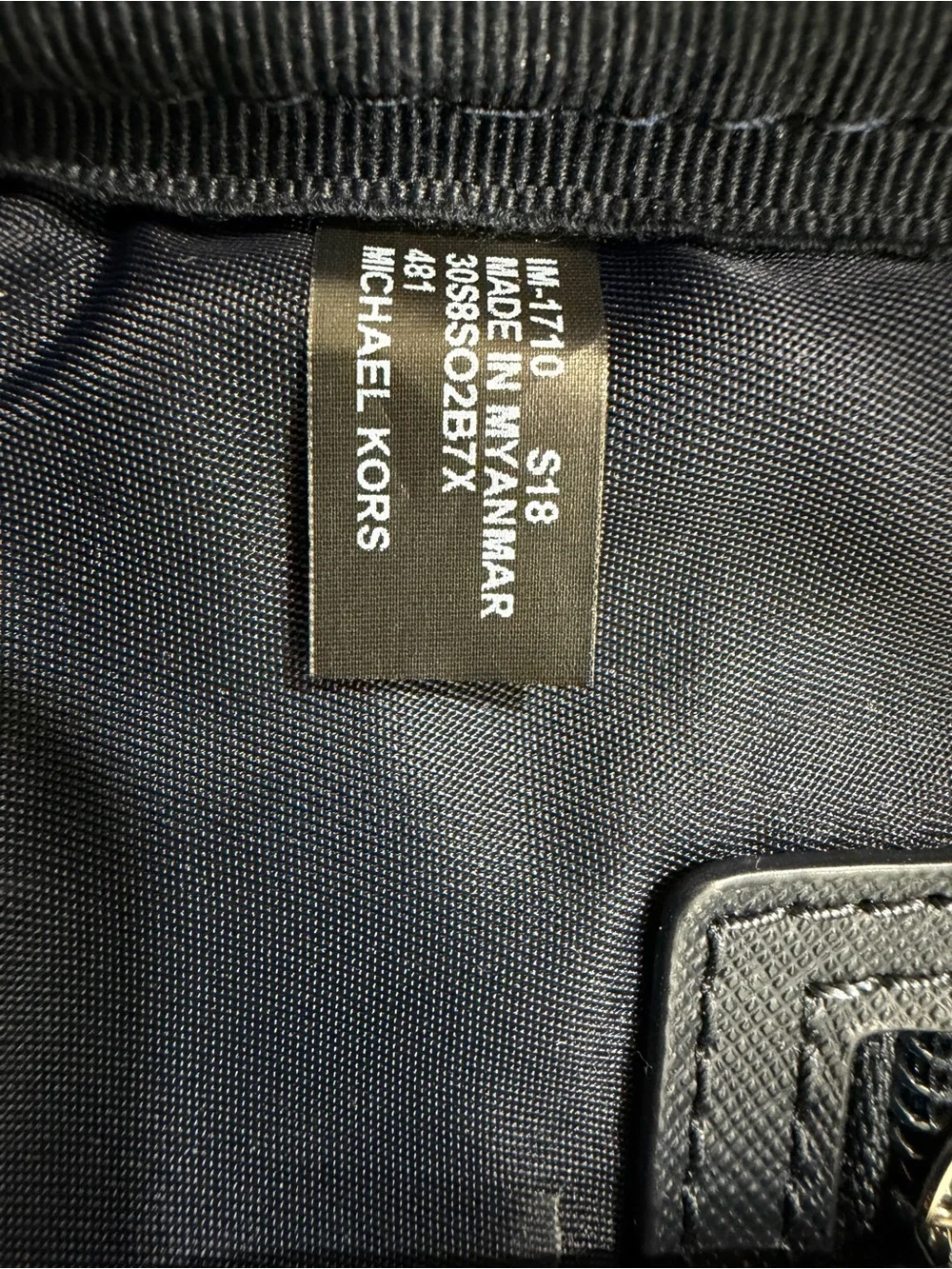 Michael Kors Navy Floral Mini Backpack with Teal and Light Blue Accents